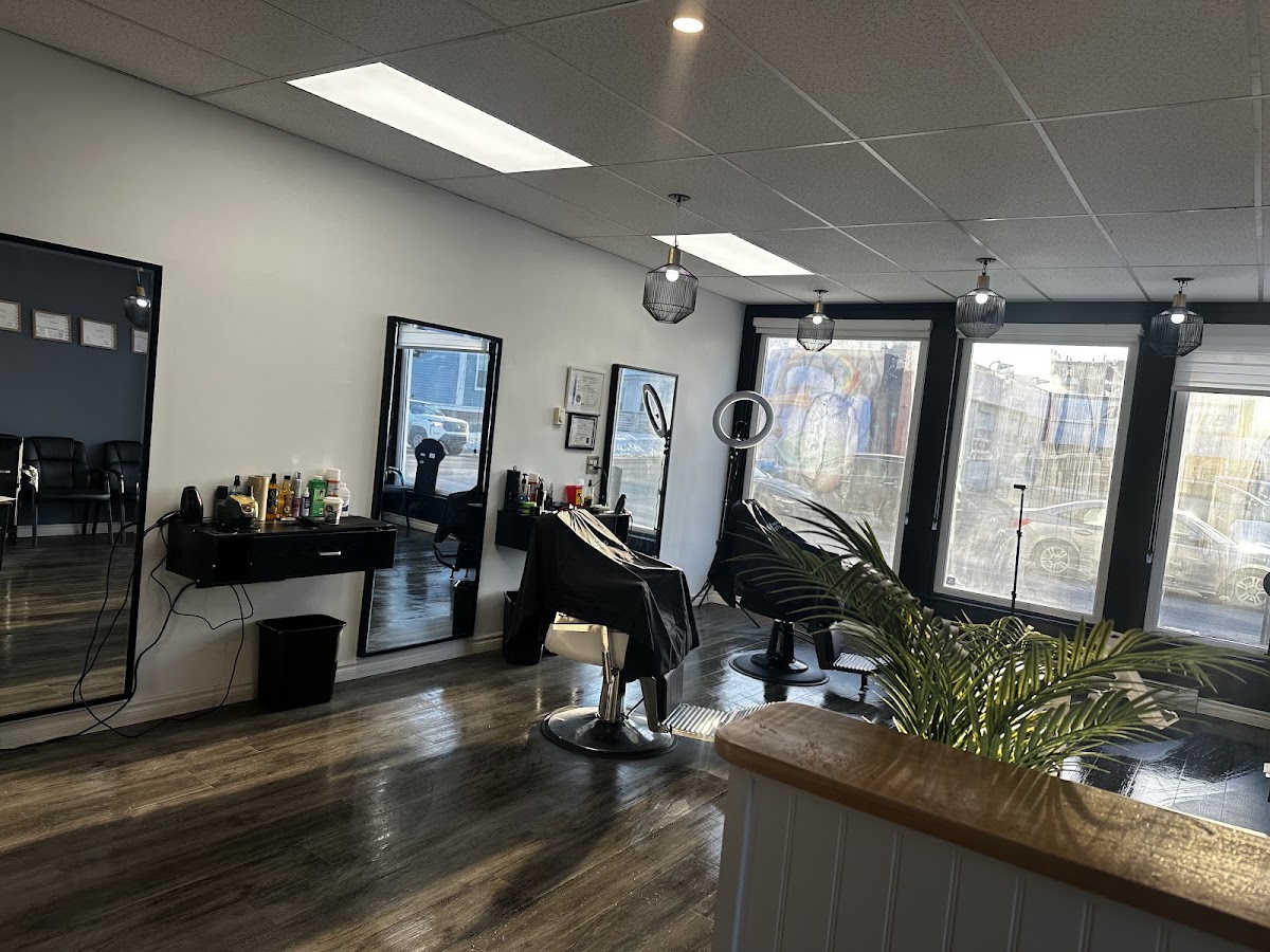Styling area with barber chairs and mirrors