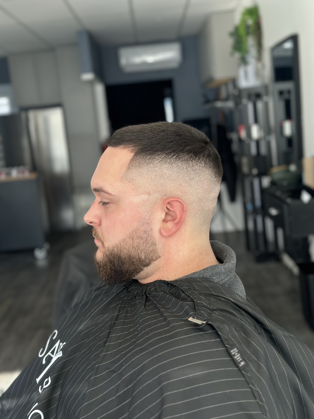 Precision skin fade with a sharp line-up